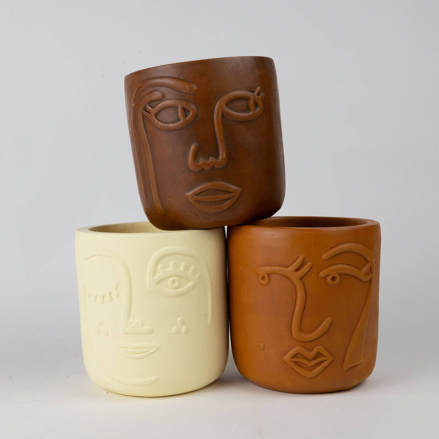 Ten Thousand Villages - Winky Face Cream Terracotta Planter 4" Ten Thousand Villages