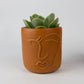 Ten Thousand Villages - Full Lashes Terracotta Face Planter 4" Ten Thousand Villages